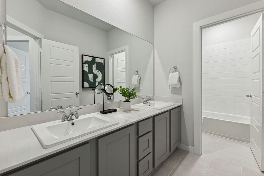 Bathroom in the Winters home plan by Trophy Signature Homes – REPRESENTATIVE PHOTO