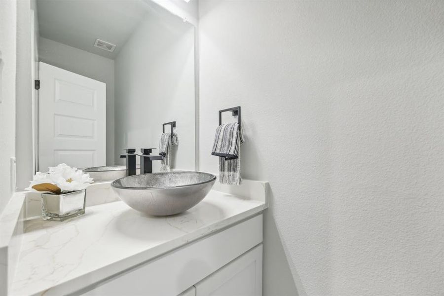 Bathroom featuring vanity