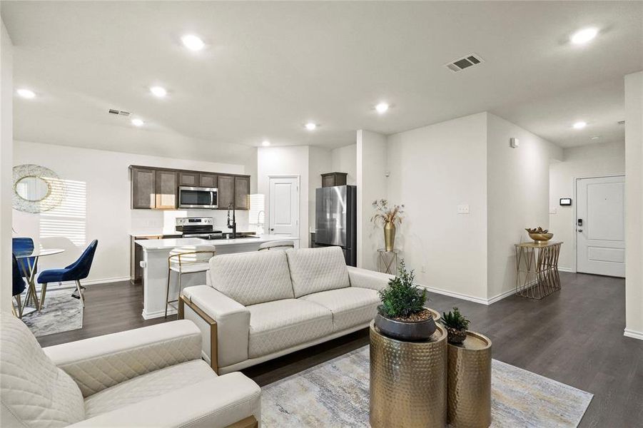 Living room with hardwood / wood-style floors