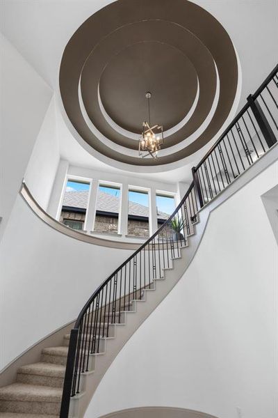 The spiral staircase with a rotunda appearance is a showstopper.  Sure to wow anyone.