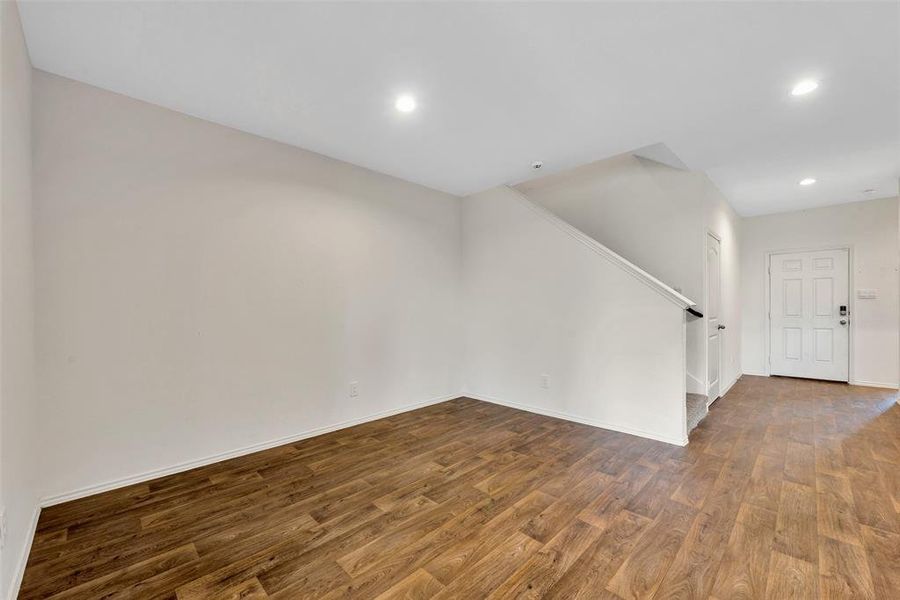 This spacious dining space is right next to the kitchen and living room - a great area to host family, friends, and enjoy your meals.