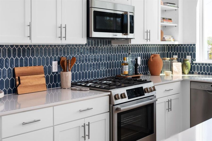 Sleek kitchen with open shelving and textured tile backsplash for a stylish finish.