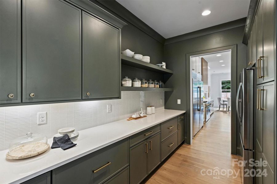 Great scullery connecting dining to the kitchen