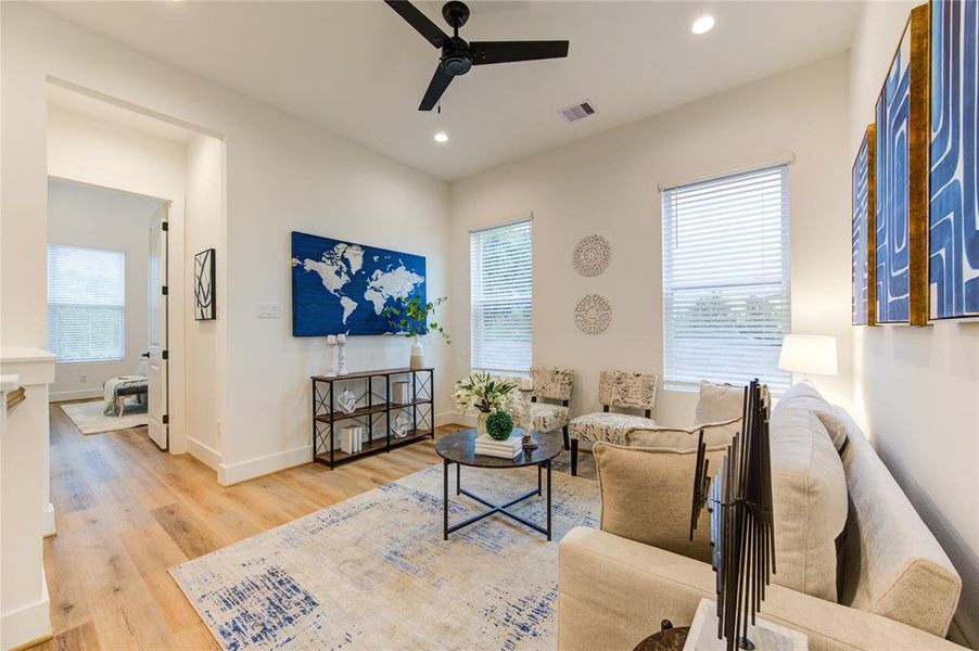 Upstairs bonus room can be used as a secondary living room (as staged), as a home office, or game room.