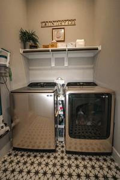 Clothes washing area with washer and dryer