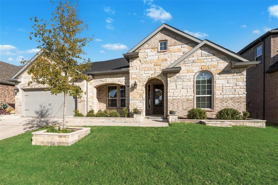 Beautiful stone and brick elevation with front porch