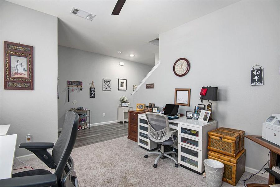 Office area with wood-type flooring