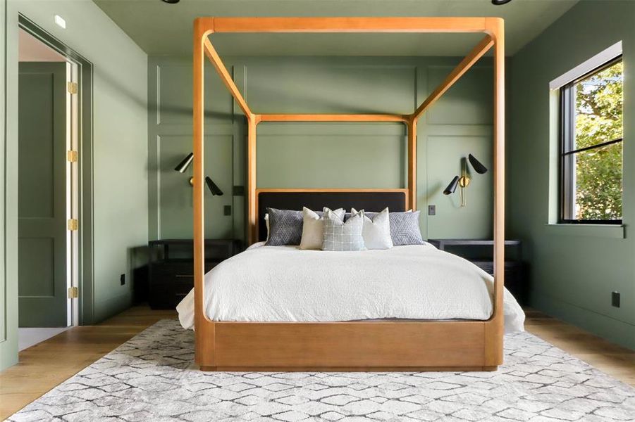 Bedroom featuring wood-type flooring and a closet