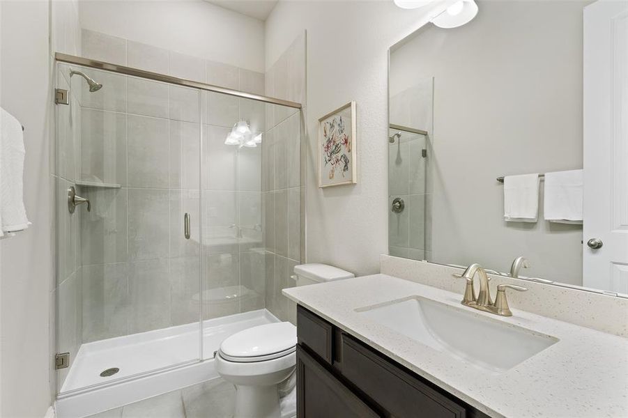 Secondary bathroom with tub and shower