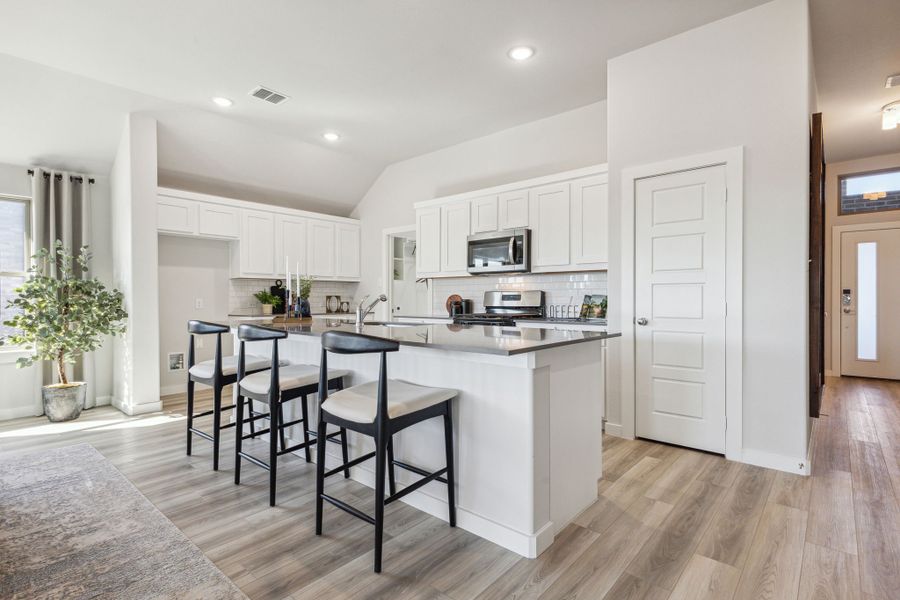 Kitchen in the Diamond home plan by Trophy Signature Homes