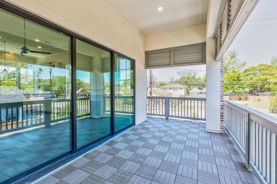 Oversized balcony with epic glass sliding trifold doors that leads seamlessly from indoor to outdoor living. Gas / water line for grilling and plug for outdoor TV.