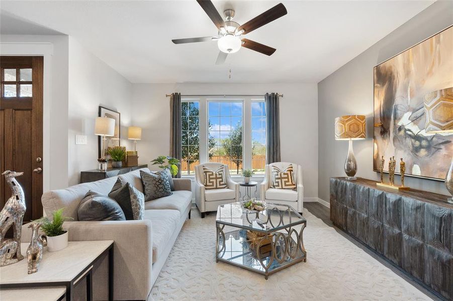 Living room featuring ceiling fan