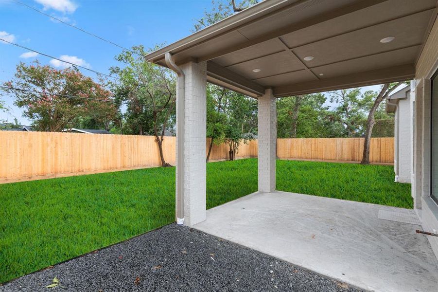 Photoshop of backyard with sod. Sod not included in home.