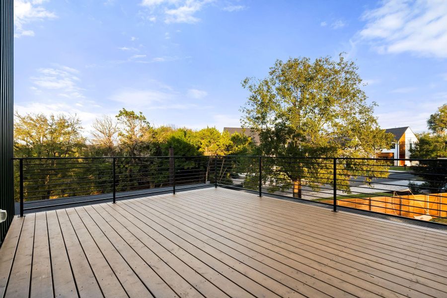 Upstairs deck with access from guest bedroom and loft.