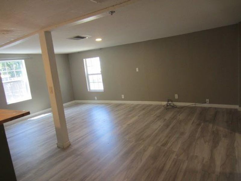 Spare room featuring hardwood / wood-style floors