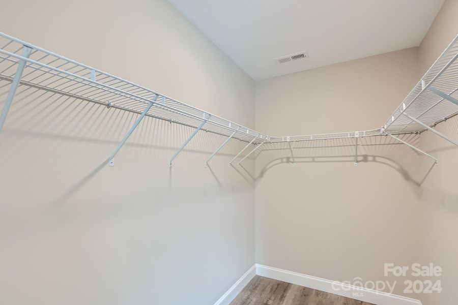 Huge walk in closet with primary suite.