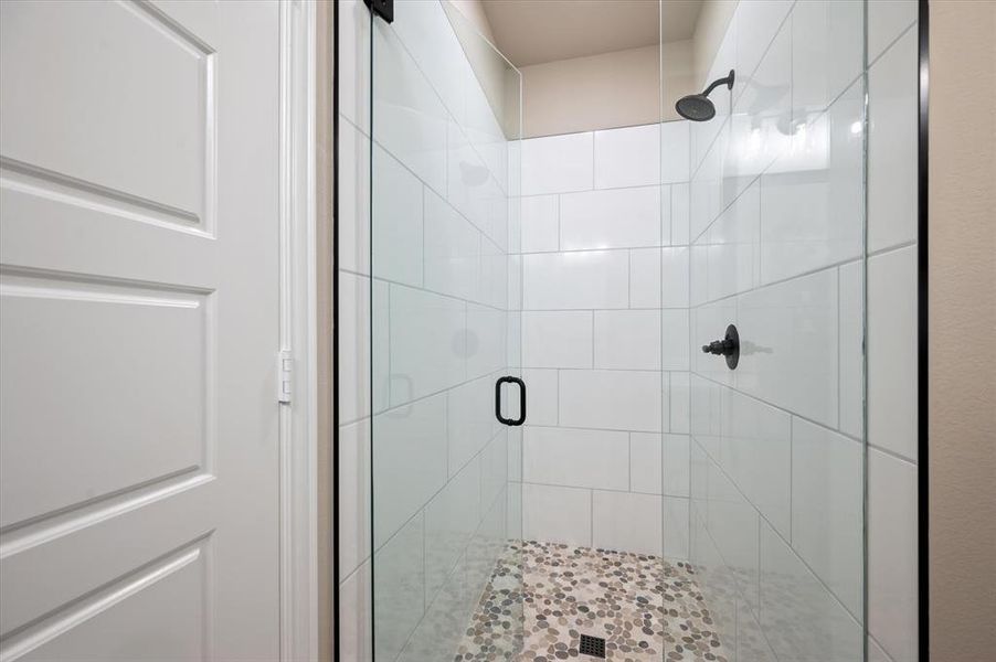 Bathroom featuring a separate walk in shower