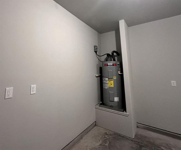 Hot water heater in the garage for easy access.