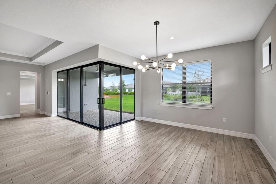 Dining room with corner glass doors