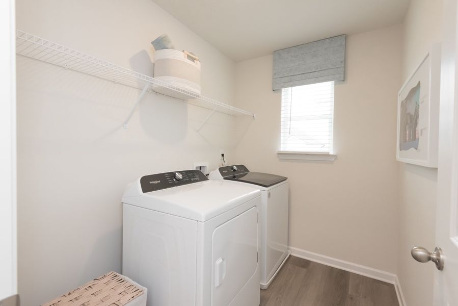 Laundry days have never been easier with this large, spacious laundry room.