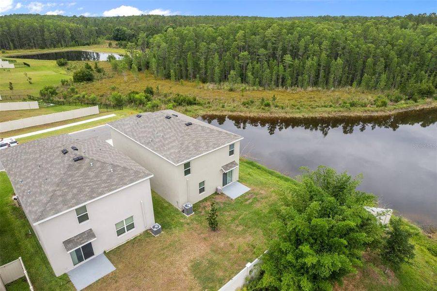 Rear of Home with Pond and Conservation View