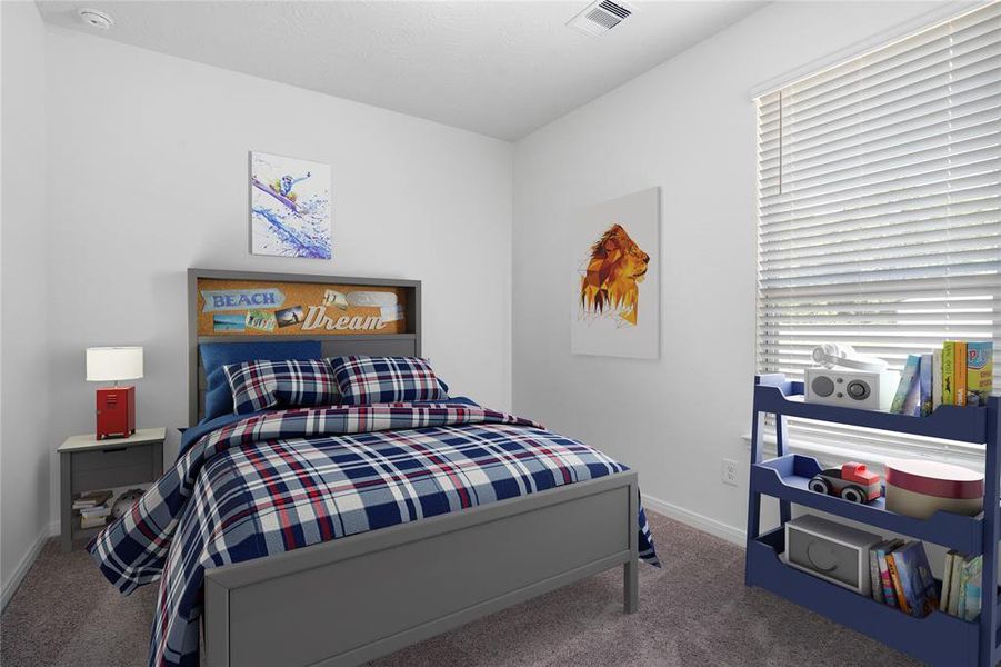 Secondary bedroom features plush carpet, neutral paint, lighting, large window with privacy blinds and ample sized closet space.