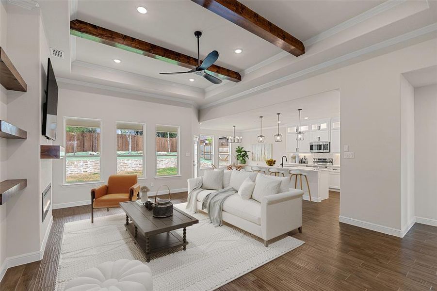 Living room featuring beam ceiling, ceiling fan, and dark wood-type flooring