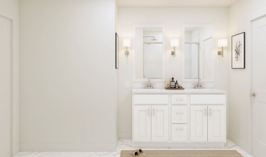 Primary bath with dual sinks and linen shade light fixtures