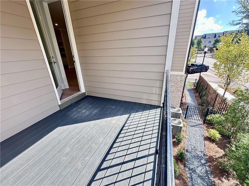 Rear deck access off the kitchen, overlooks your fenced in backyard