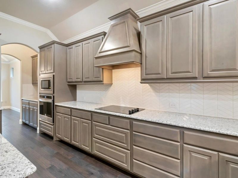 Kitchen | Concept 2533 at Oak Hills in Burleson, TX by Landsea Homes