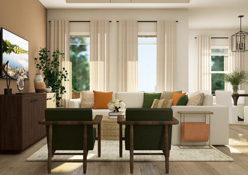 Rendering of the open floor plan of the Iris highlighting the flow from the living room to the dining area. Large windows provide plenty of natural light.