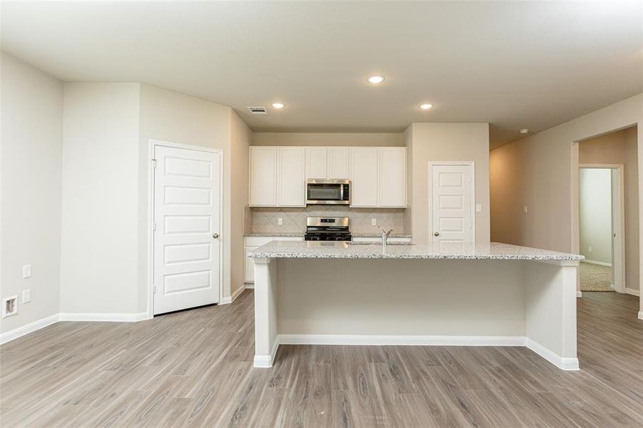 Photos are a representation of the floor plan. Options and interior selections will vary.