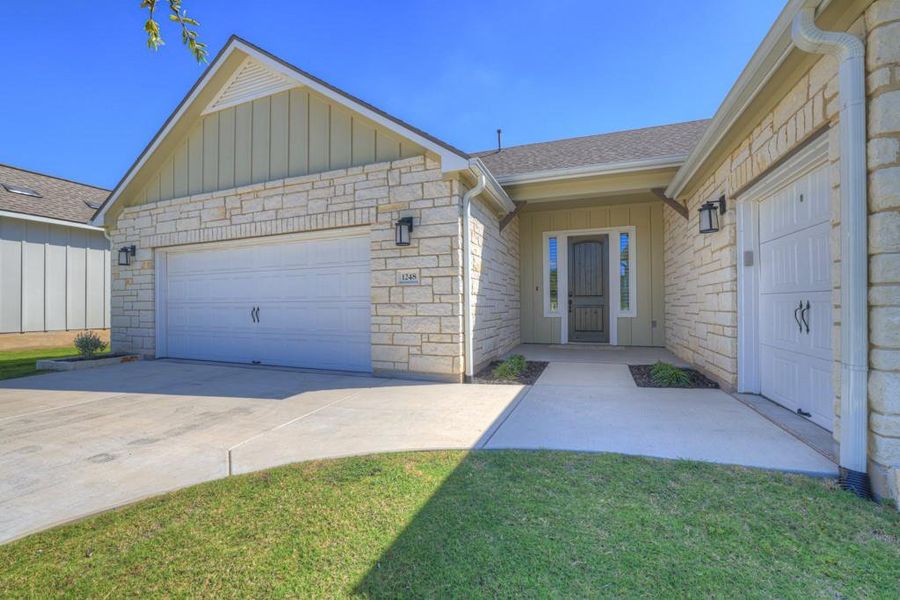 2 car garage w/ additional golf cart garage