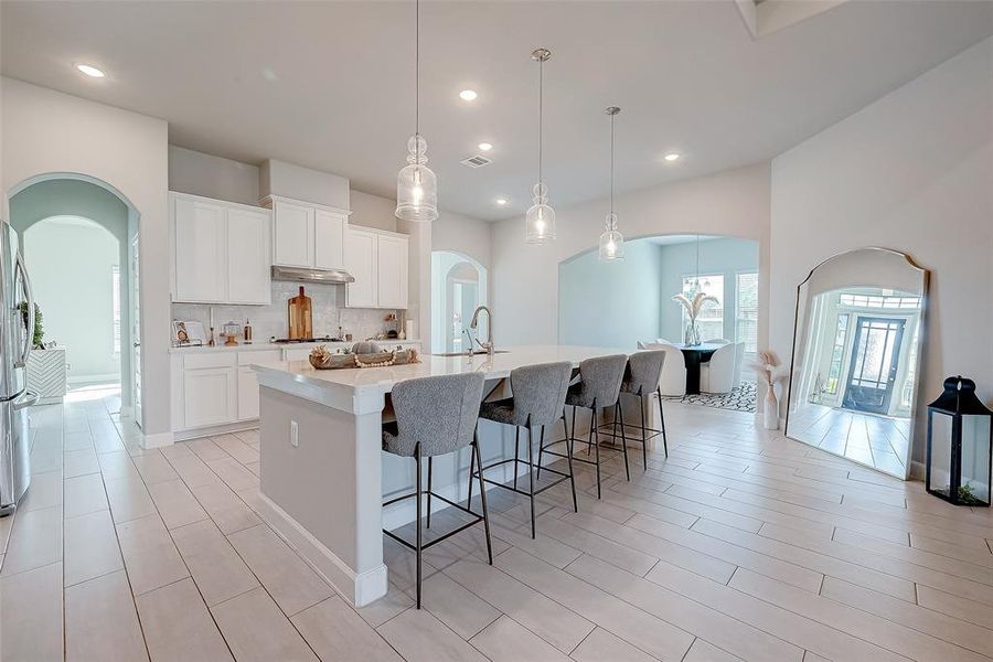 Step into this modern kitchen, wherefunctionality meets sophistication.