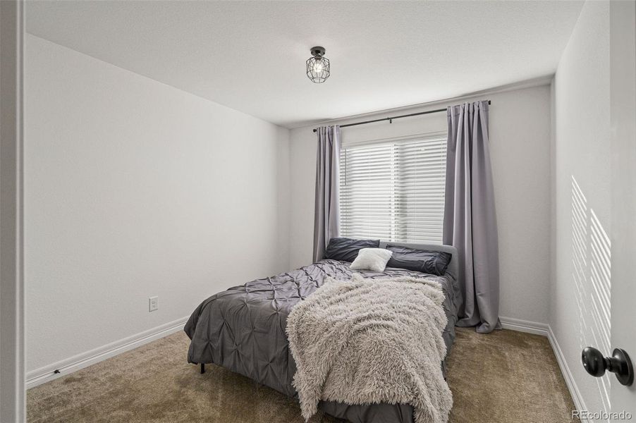 Secondary bedroom walk in closet