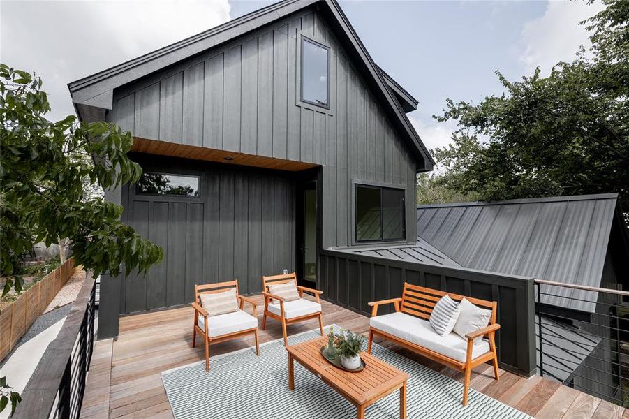 Expansive upper deck with luxurious Brazilian Ipe wood and custom railing.