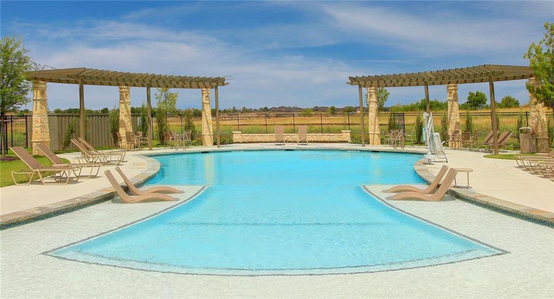 View of swimming pool featuring a pergola and a patio area