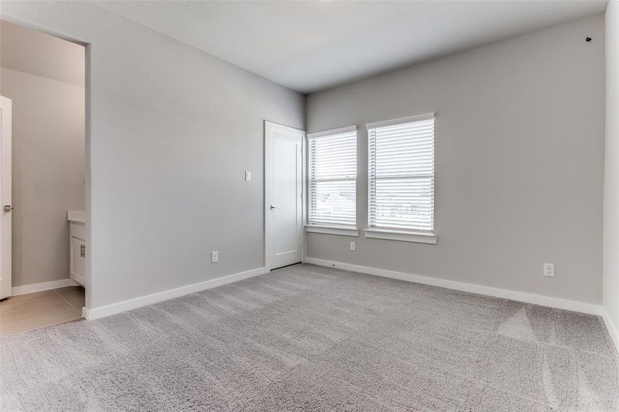 View of carpeted spare room