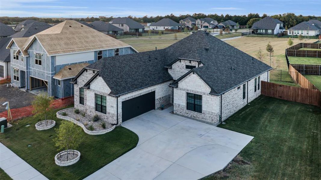 Aerial view - Backs up to the greenbelt and has a large side yard!