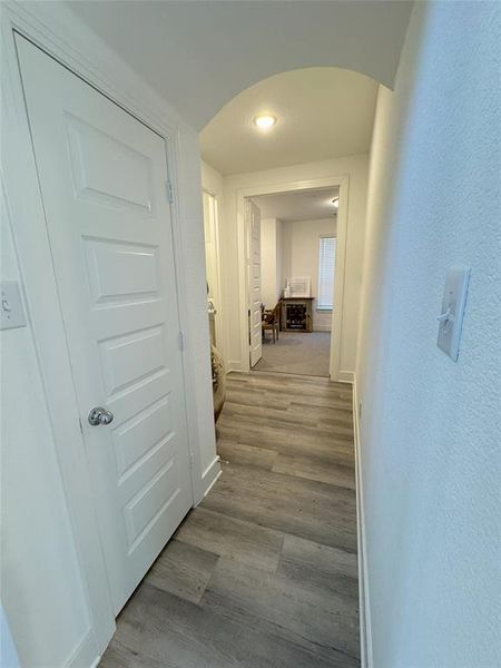 Corridor featuring light hardwood / wood-style flooring