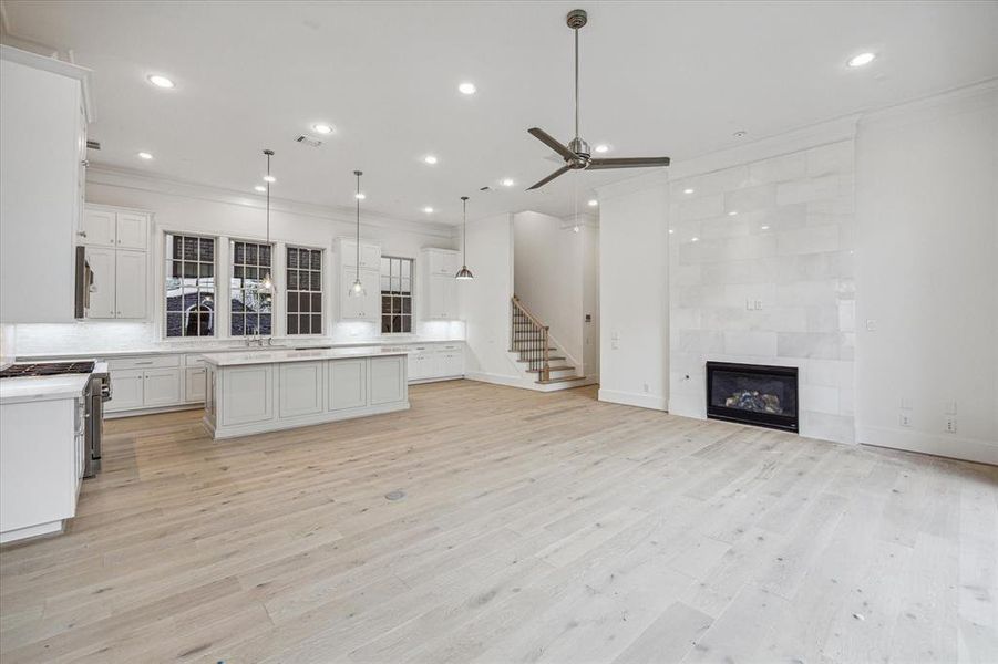 Spacious liiving room on the first level opens to the kitchen.