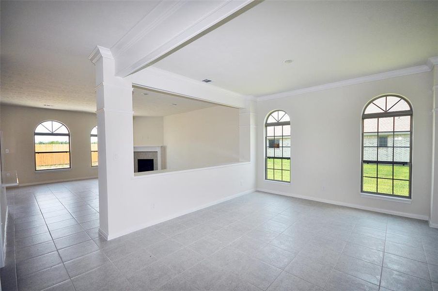 Dining room with ceramic tile flooring.