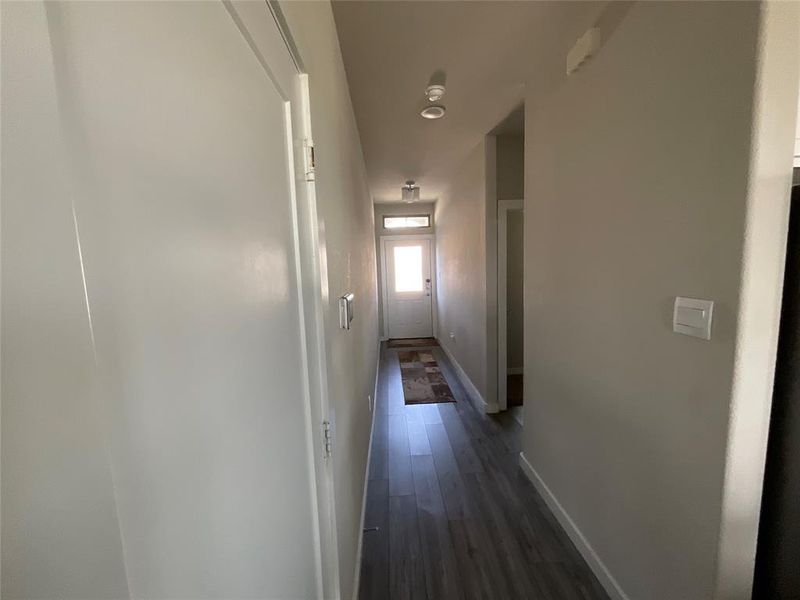 Hall featuring dark hardwood / wood-style flooring