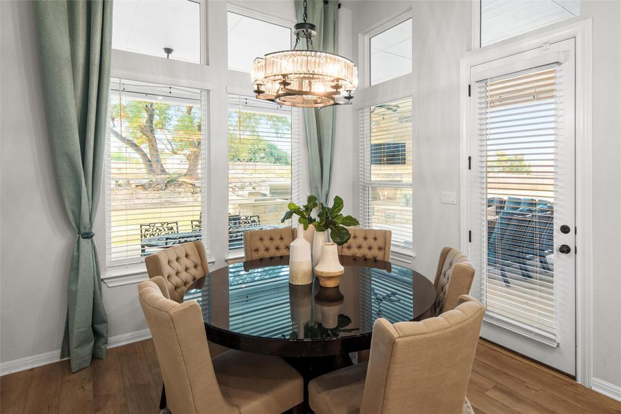 The dining area looks out to the large covered patio