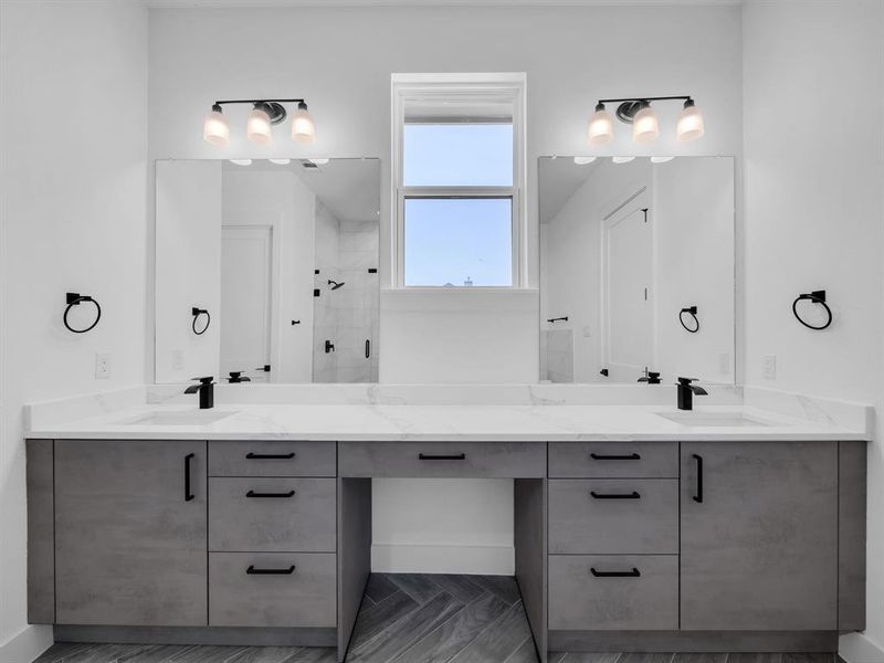 Bathroom with vanity and an enclosed shower