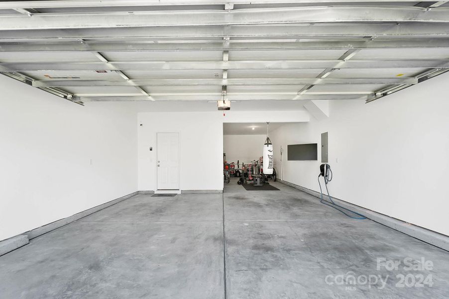 oversized garage, with tandem parking space