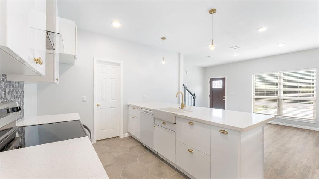 Sink Overlooks Into The Family Room So You Don't Miss Any Of The Action While Getting All Those Chores Done