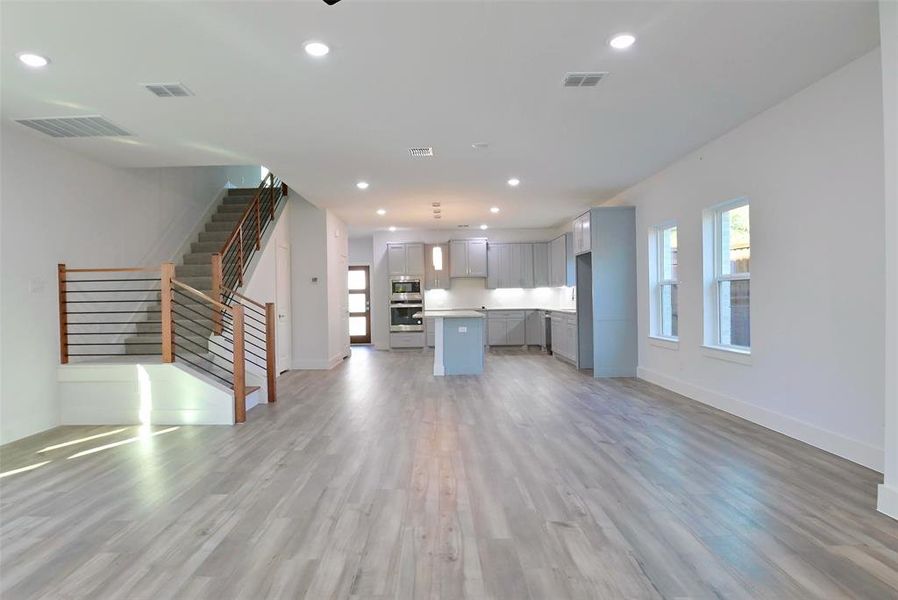 Unfurnished living room featuring light hardwood / wood-style flooring