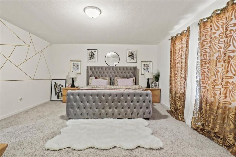 Bedroom featuring carpet