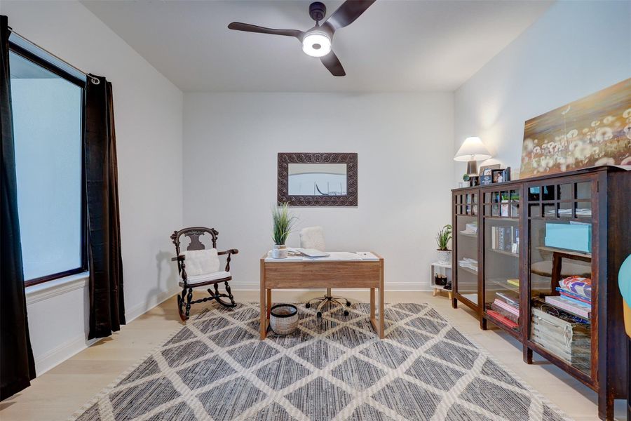 Main Office with View of Front, Ceiling Fan and Wood Floors